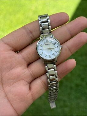 Armitron women’s Silver Stainless Bracelet Watch with mother of pearl dial